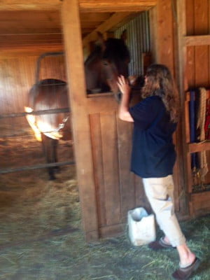 Linda K in horse stall